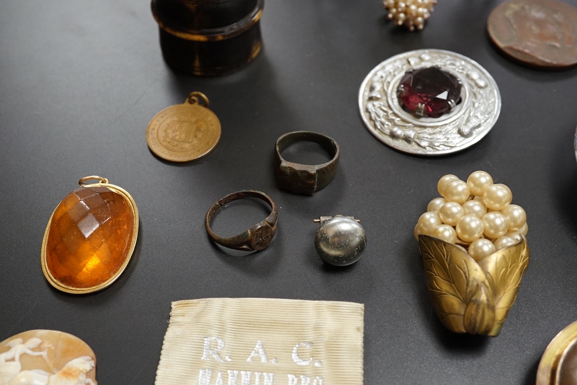 Objects of vertu and medals, including two Paris porcelain painted brooches, a leather cased almanac for 1827 and a painted ‘I Love You’ metal patch box